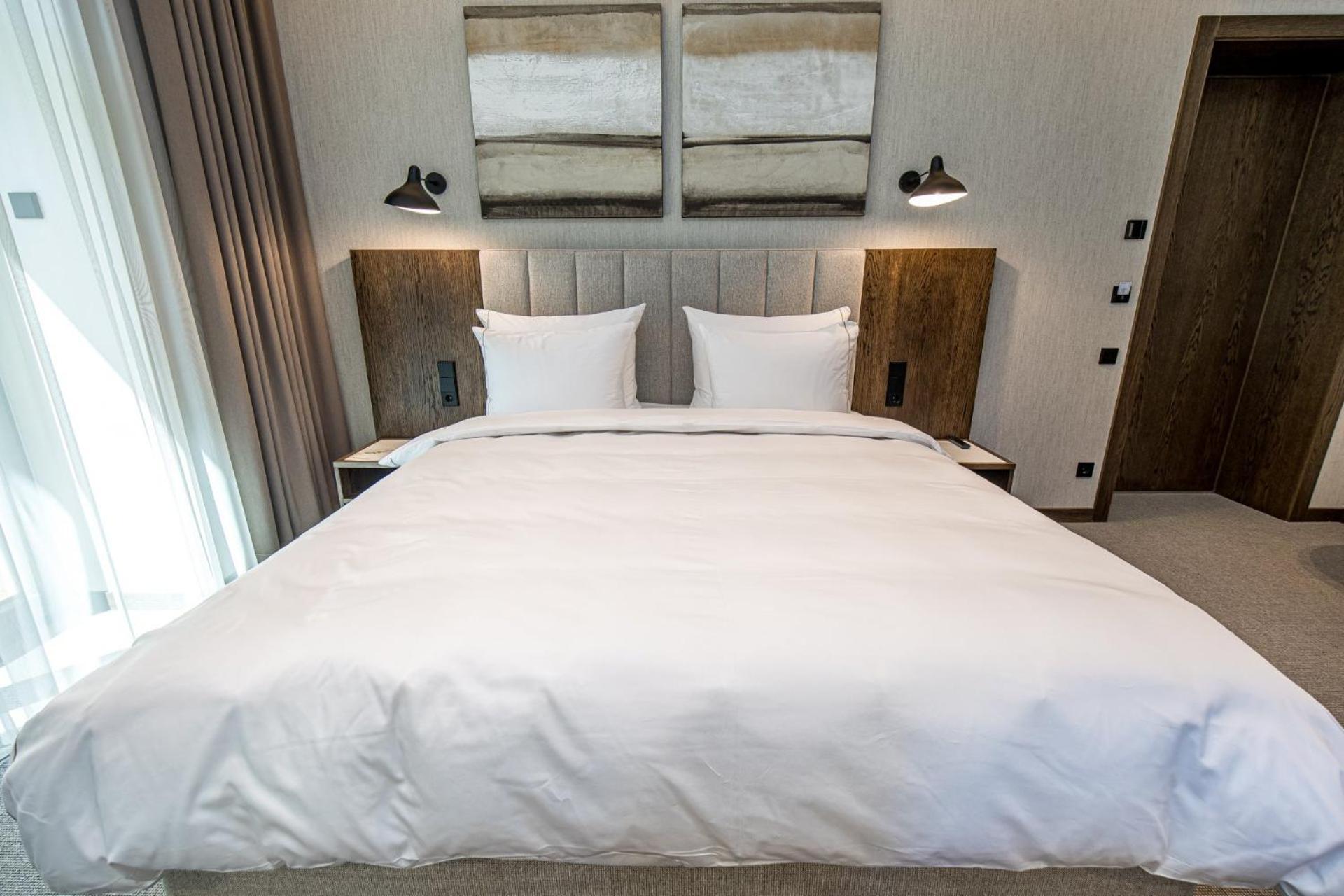 Palanga Life Balance Spa Hotel Chambre photo A bed with a duvet